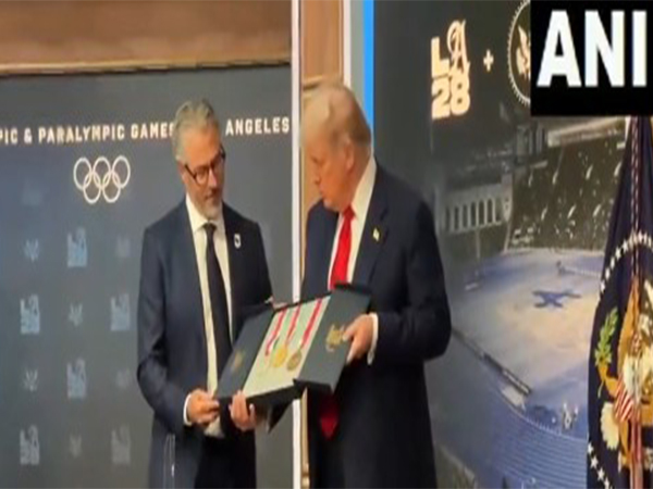 LA Olympics chairman Casey Wasserman (L) and US President Donald Trump (R). (Photo: ANI)