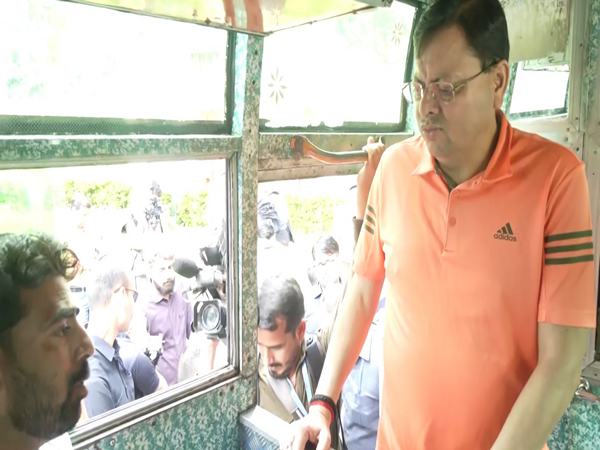 CM Pushkar Singh Dhami interacts with evacuees and rescue personnel at Matli Helipad in Uttarkashi (Photo/ANI)