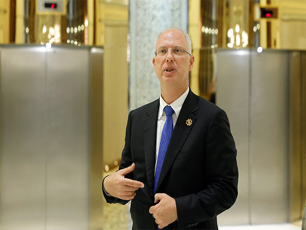 Kirill Dmitriev, head of Russia's sovereign wealth fund, interacts with delegation members and journalists following the U.S.-Russia talks in Riyadh, Saudi Arabia, on February 18, 2025 (File Photo/Reuters)