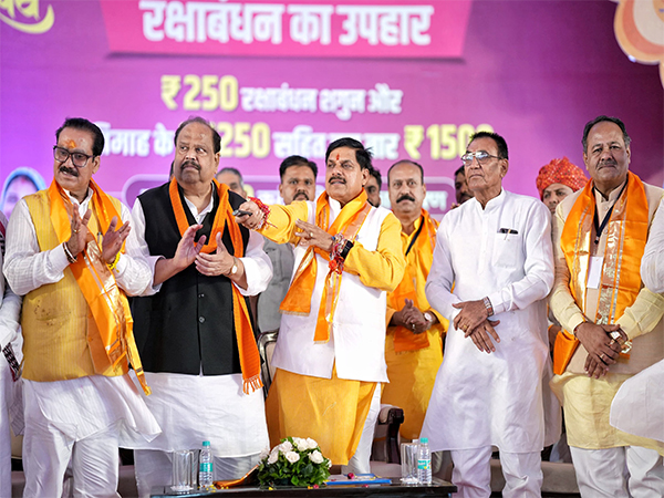 MP CM Mohan Yadav transferring Rakhi Shagun (Photo/X @DrMohanYadav51)