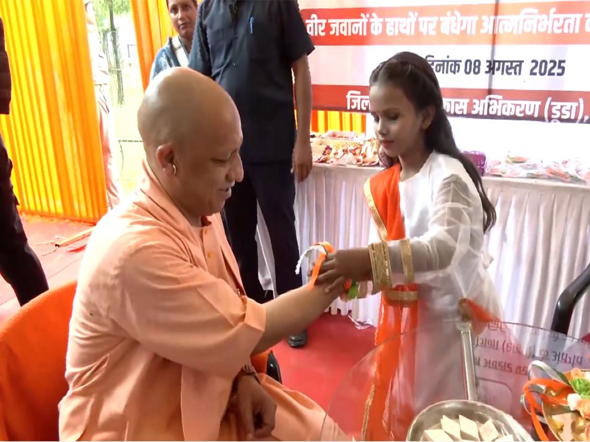CM Yogi celebrating raksha bandhan during his visit at  Kakori Shaheed Memorial (Photo/ANI)