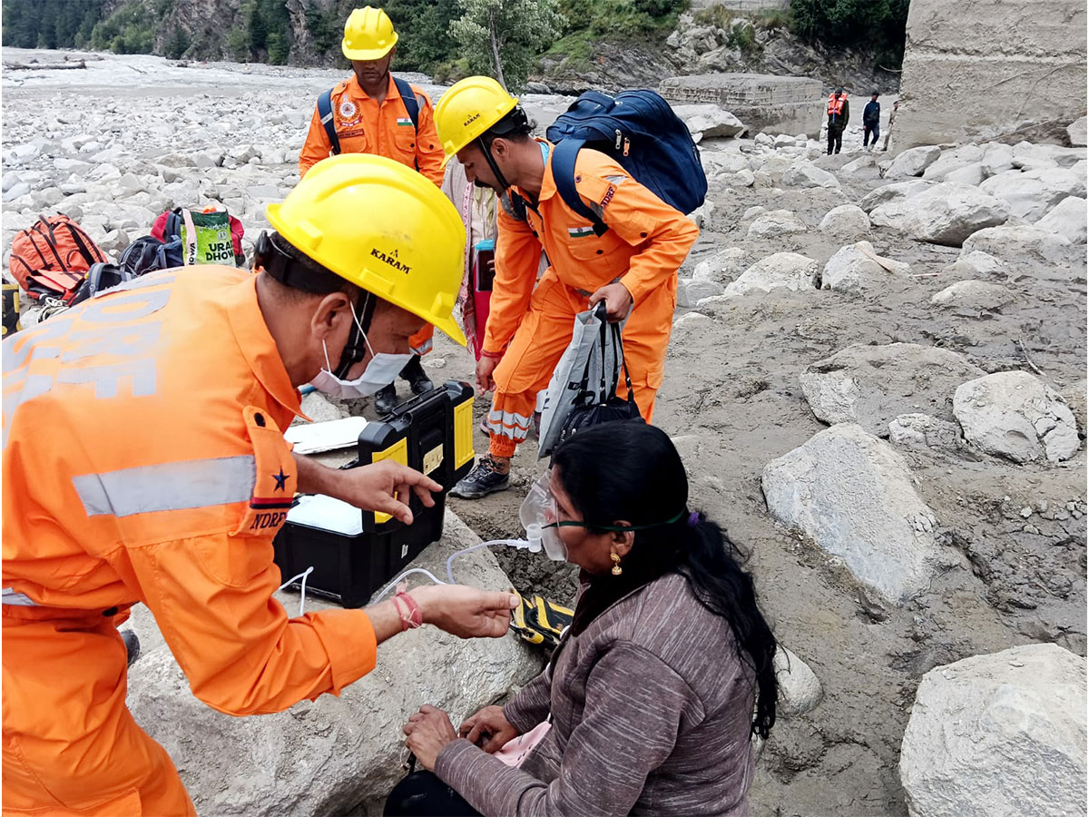 NDRF personnel provide medical aid in Uttarkashi (Photo/ANI)