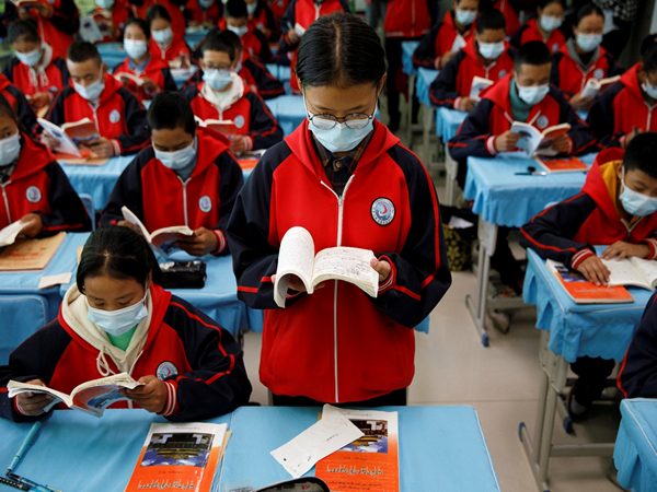 Students attend a Tibetan composition class in a school in Lhasa (File Photo/ Reuters)