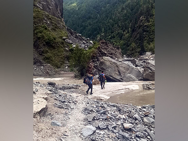 Uttarakhand Police Flood Company personnel conduct search and rescue operations on the disaster affected route (Photo/ANI)