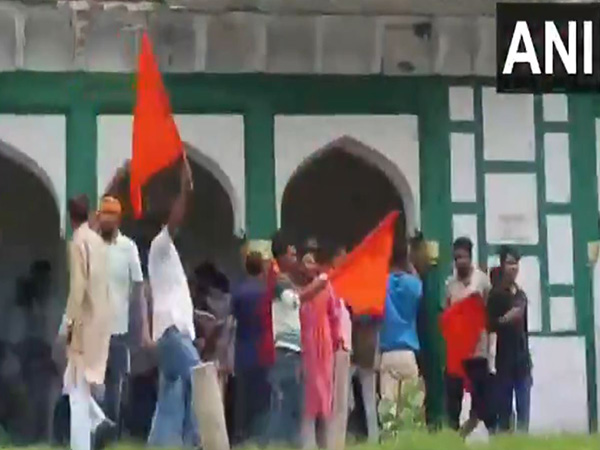 Mob gather near old tomb in Abu Nagar on Monday. (Photo/ANI)
