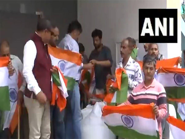 Doda District administration distributes 1 lakh national flags under ‘Har Ghar Tiranga’ Campaign (Photo/ANI)