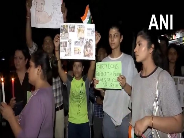 Animal right activists and animal lovers took out candlelight march in Rohini (Photo/ANI)
