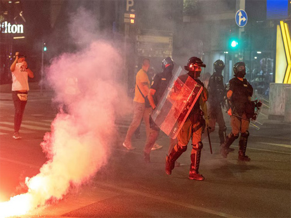 Police intervene in Serbia to disperse clashes between ruling party supporters and anti-government protesters (Photo/Reuters)