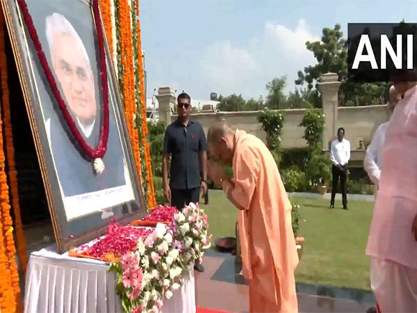Uttar Pradesh CM pays floral tribute to Atal Bihari Vajpayee on his death anniversary at Lok Bhawan in Lucknow (Photo/ANI)