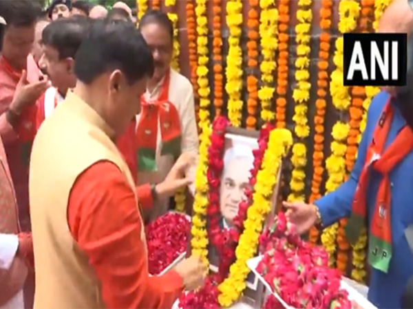 MP CM Mohan Yadav paying floral tribute to Atal Bihari Vajpayee (Photo/ANI) 