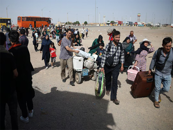 Afghan nationals deported from Iran seen arriving at a returnees’ camp near the Islam Qala border crossing in Herat province, Afghanistan (File Photo/Reuters)
