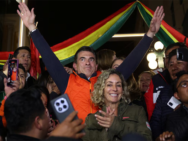 Bolivian presidential candidate Centrist Senator Rodrigo Paz of PDC, with wife Maria Elena Urquidi, on early results show him leading (Photo/Reuters)