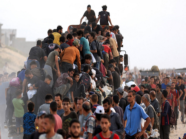 Palestinians climb onto a truck while waiting for aid amid worsening humanitarian crisis in Gaza (Photo/Reuters)