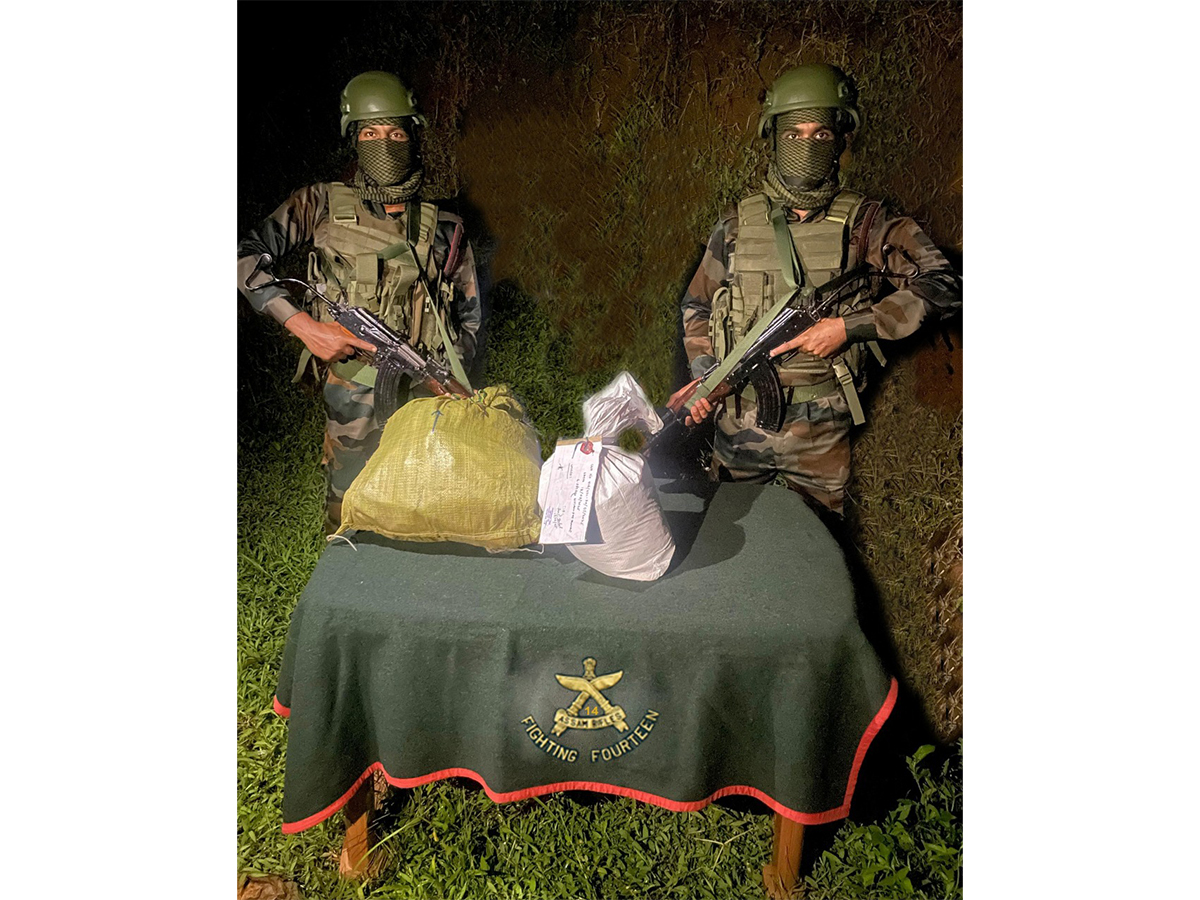 Assam Rifles with the seized Methamphetamine tablets. (Photo/ANI)