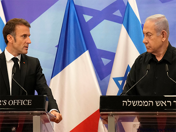 Israeli Prime Minister Benjamin Netanyahu with French President Emmanuel Macron during a joint press conference in Jerusalem (File Photo/Reuters)
