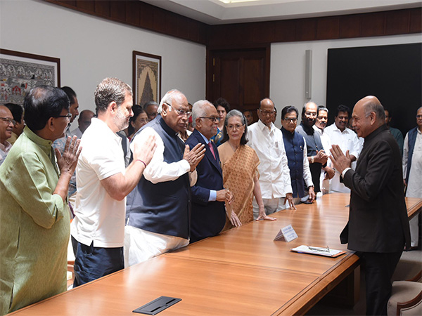 Congress chief Mallikarjun Kharge, along with other INDIA bloc leaders congratulating B Sudharshen Reddy (Photo/X @Kharge)