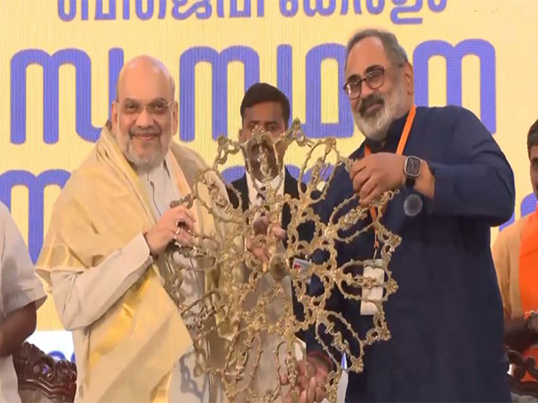 Union Minister Amit Shah with Kerala BJP chief Rajeev Chandrasekhar (Photo/ANI)