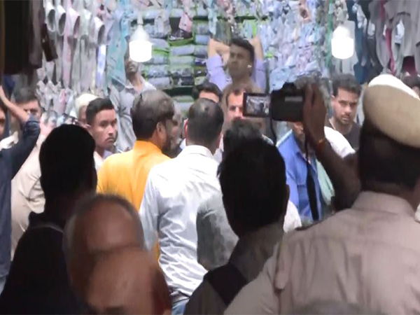 Police apprehends Praveen Sharma for sloganeering (Photo/ANI)