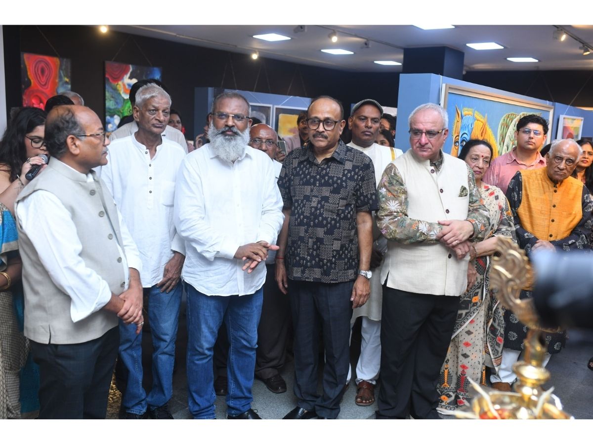 Vishal Goyal, Curator, Dali by Comdez, with artist & retired IAS officer TK Manoj Kumar, Co-Founder Partha S. Mitra, inaugurating Past Forward, India Habitat