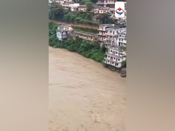 Visuals of river flowing above danger mark (Photo/X @DIPR_UK)