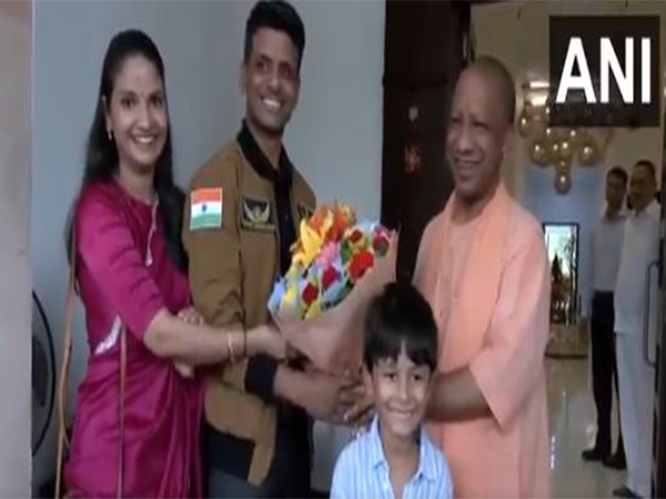 UP CM Yogi Adityanath meets Group Captain Shubanshu Shukla (Photo/ANI)