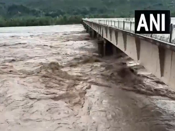 Chenab River in J-K is in full spate on Wednesday following heavy rain (Photo/ANI)