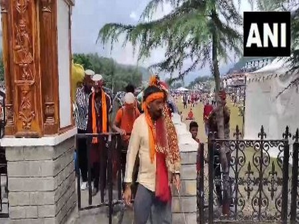 Devotees return from Chamba after Manimahesh Yatra was suspended. (Photo/ANI)