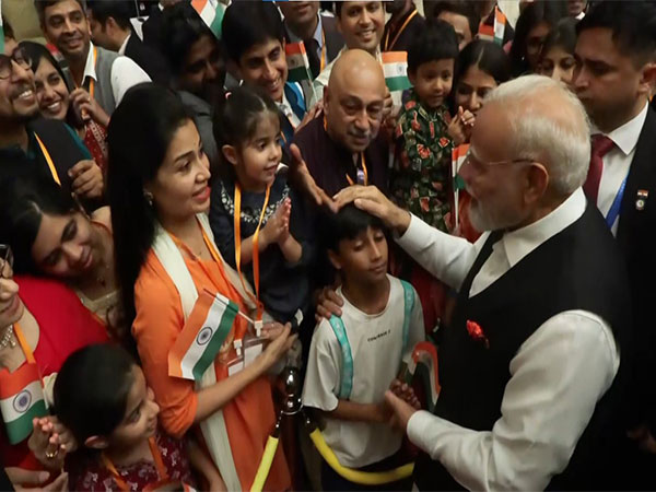 Members of Indian diaspora give warm welcome to PM Modi in Tianjin. (Photo/ANI)