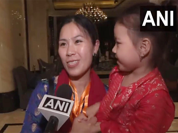 A Chinese woman married to an Indian speaks to ANI after PM Modi's arrival at the hotel in Tianjin city (Photo/ANI).
