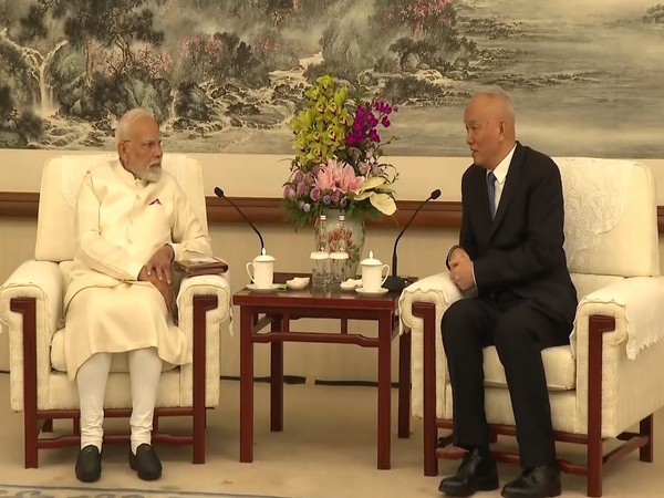 PM Modi with CCP Secretariat Secretary Cai Qi (Photo: ANI/DD)