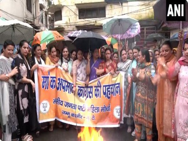 A protesting woman from BJP Mahila Morcha. (Photo/ANI)