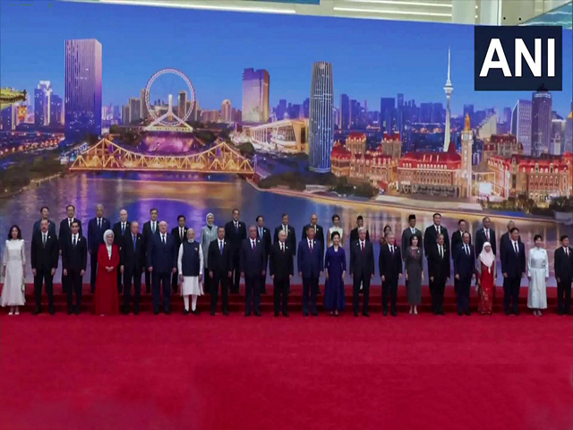 PM Modi poses for group photo with world leaders at SCO summit reception in Tianjin, China on August 31, 2025(Photo/ANI)