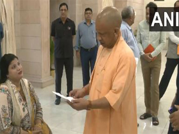UP CM Yogi Adityanath holds Janata Darshan (Photo/ANI)