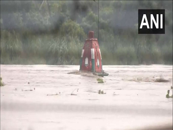 Visual of Delhi's Nigam Bodh Ghat area flooded as water level of River Yamuna rises. (Photo/ANI)