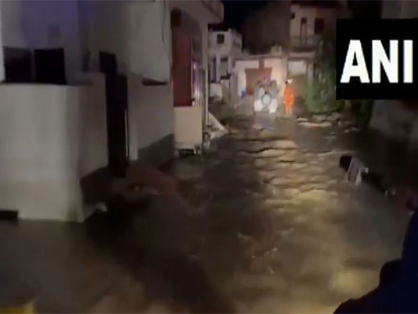 Boraj dam collapses in Rajasthan's Ajmer; streets flooded, people rescued. (Photo/ANI)