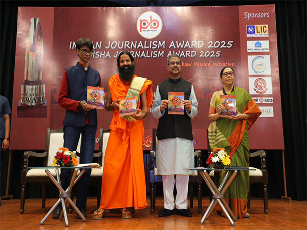 Union Minister Dharmendra Pradhan (R) with Yog guru Baba Ramdev (L) at Odisha Journalism Award 2025 event in Delhi. (Photo/ANI)