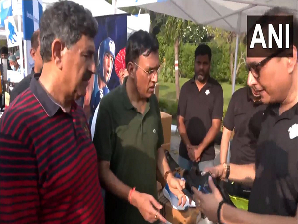Union Minister Mansukh Mandaviya visits 'Garv se Swadeshi' stalls during 'Fit India' cycle rally in Delhi's Dhyan Chand Stadium. (Photo/ANI)