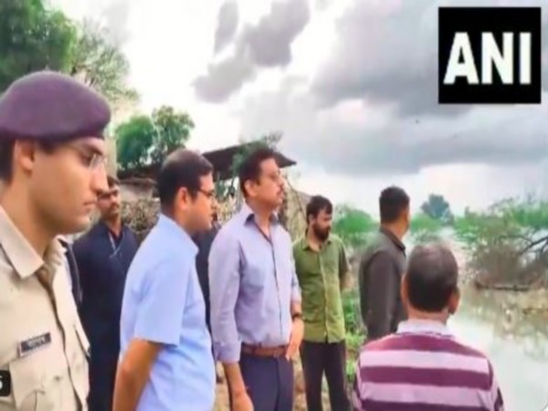 Rajasthan minister Rajyavardhan Singh Rathore visits flood-hit areas in Dausa (Photo/ANI) 