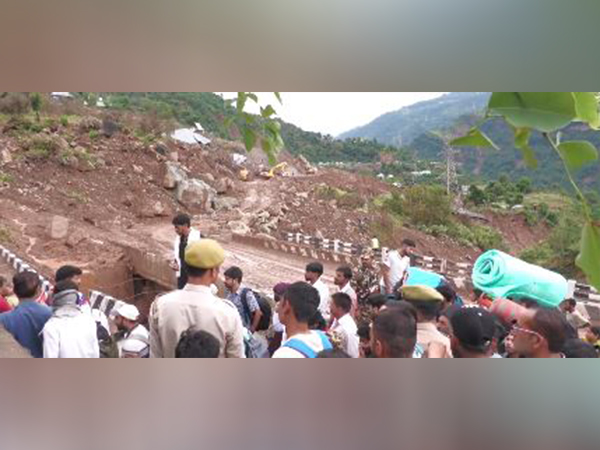 Locals navigate routes through makeshift paths in landslide affected areas (Photo/ANI)