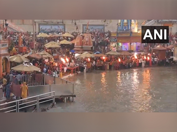 Devotees take a holy dip in the River Ganga after a total lunar eclipse (Photo/ANI)