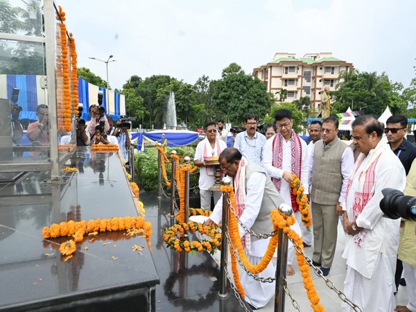 Assam Governor Lakshman Prasad Acharya and Chief Minister Himanta Biswa Sarma pay floral tributes to Bharat Ratna Dr Bhupen Hazarika. (Photo/ANI)