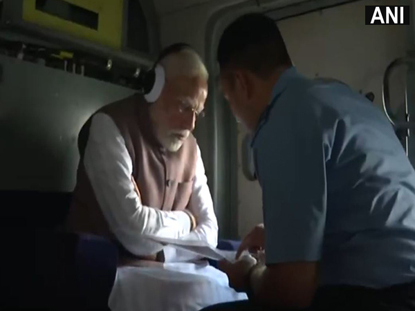 PM Modi conducts aerial survey of flood-hit areas of Punjab (Photo/ANI)