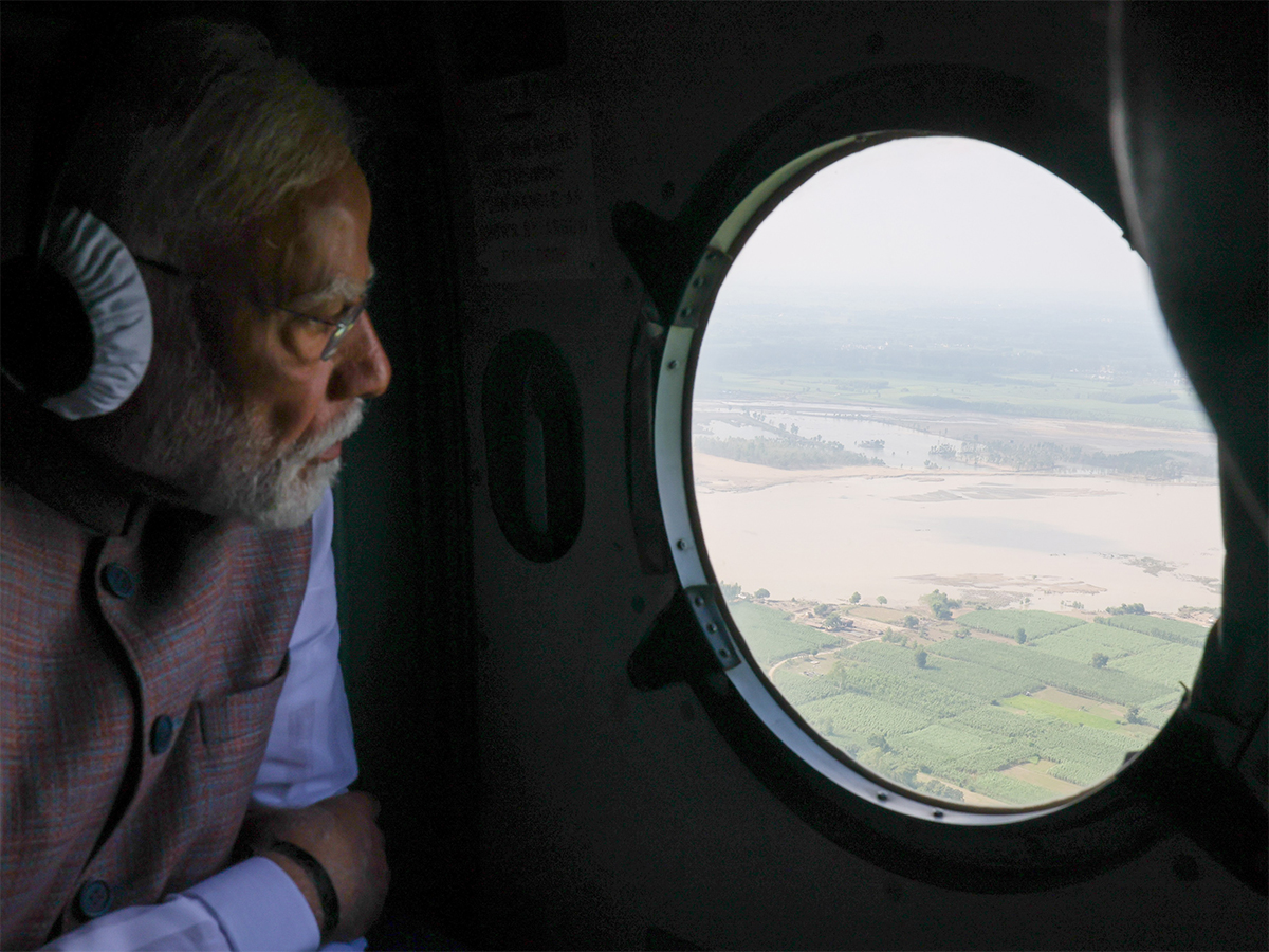 Prime Minister Narendra Modi undertaking aerial view of flood situation in Punjab (Photo/ANI)
