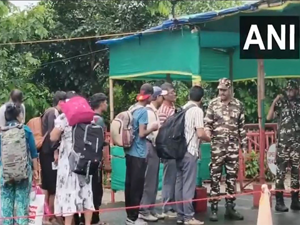 Indians cross India-Nepal border in Panitanki amid tense situation in Nepal (Photo/ANI)