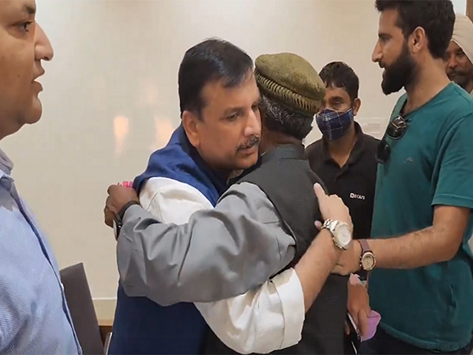 AAP leader Sanjay Singh meets Mehraj Malik’s family in Jammu. (Photo/ANI)