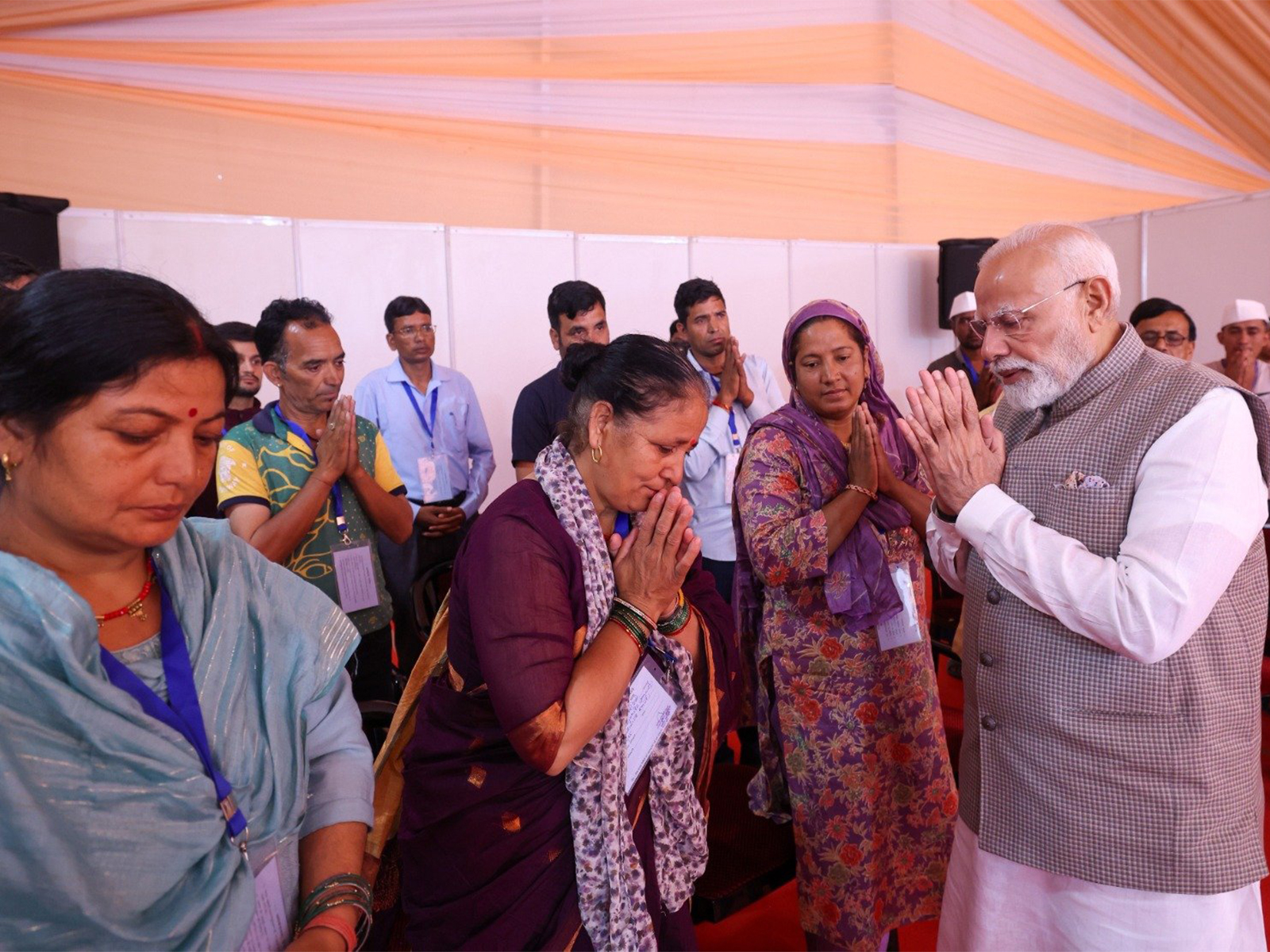 PM Modi interacts with families affected by floods in Uttarakhand (Photo/X@narendramodi)