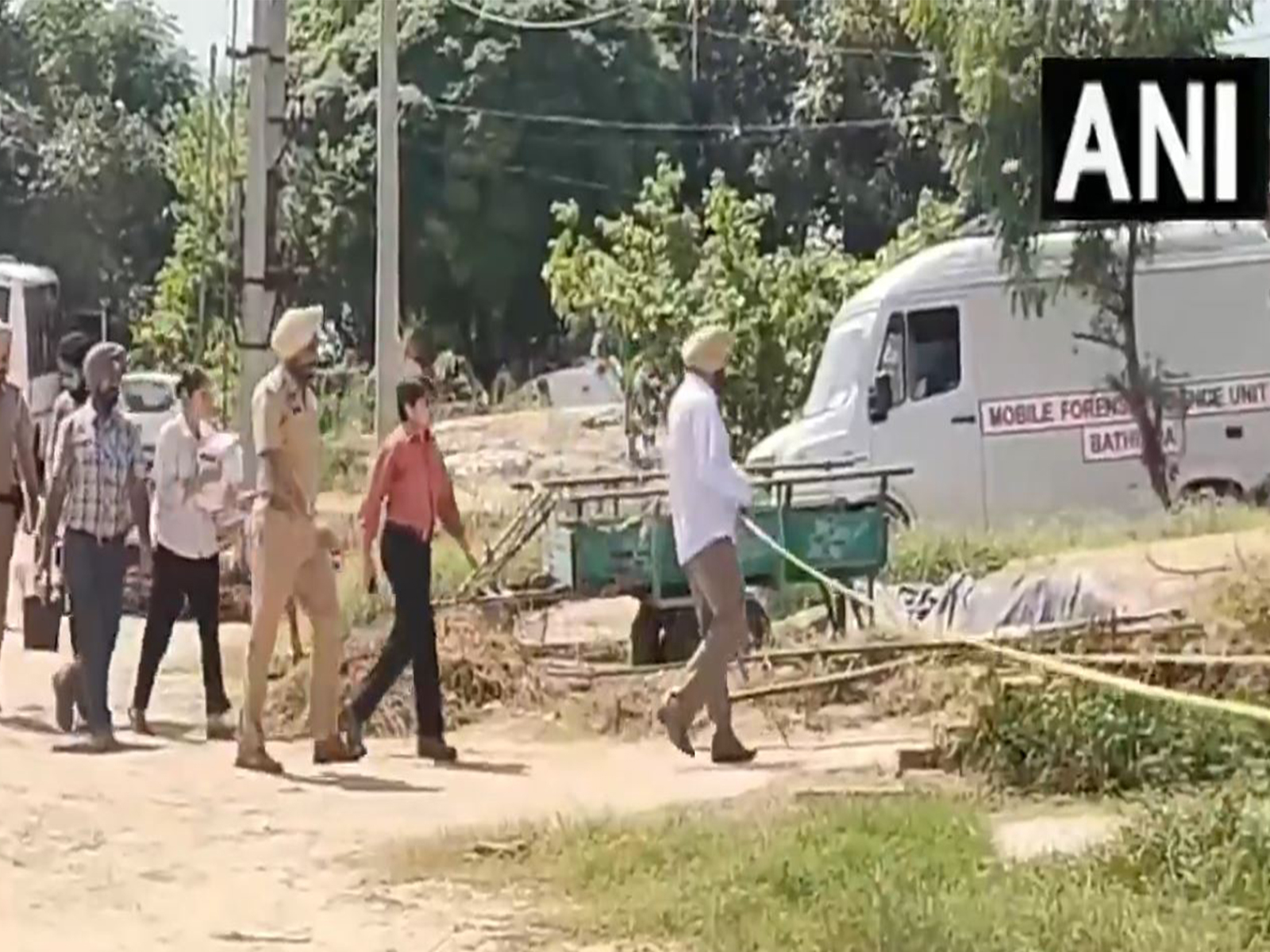 Police and forensic teams inspecting the site (Photo/ANI)