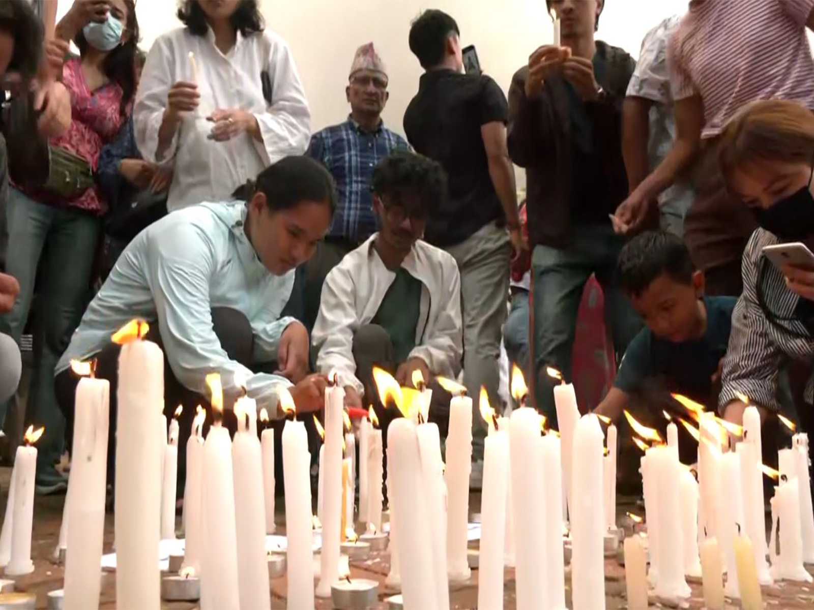 Nepal citizens hold candlelight vigil at Bouddhanath Stupa to honour victims of September 8 protest (Photo/ANI)