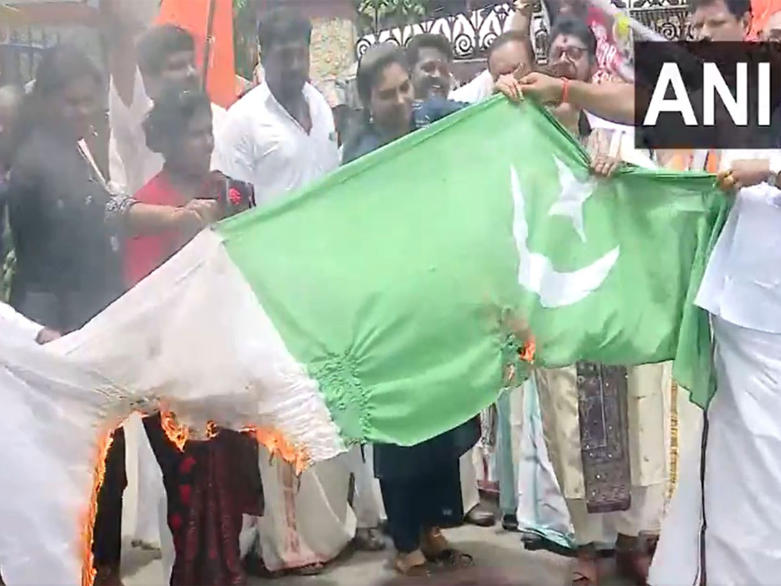 Shiv Sena (UBT) burns Pakistani national flag in protest against Ind-Pak match (Photo/ANI)