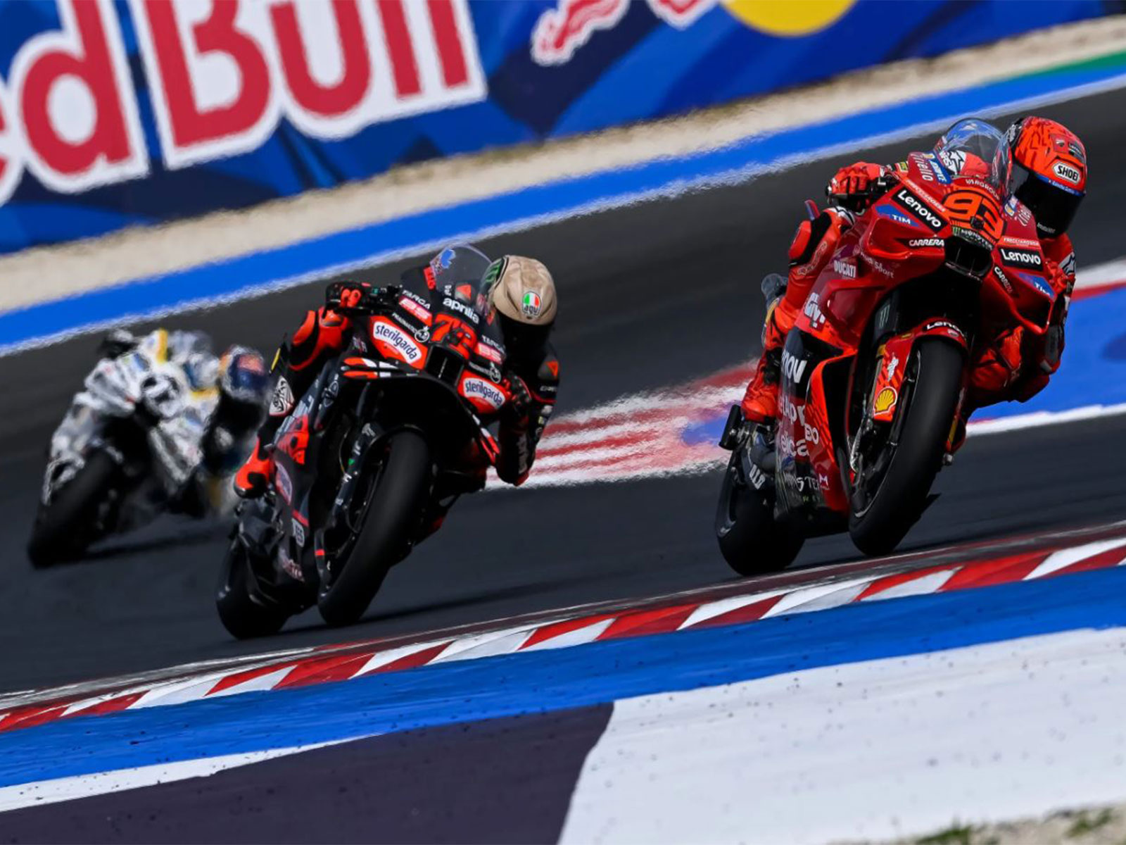 Marc Marquez(Ducati Lenovo Team) and Marco Bezzecchi (Aprilia Racing) in action during Italian GP (Image: MotoGP)